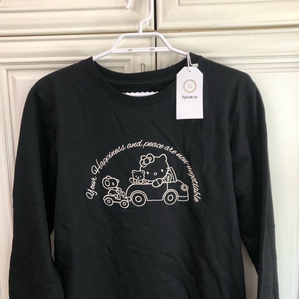 NWT Wear 18 woman’s graphic sweatshirt
